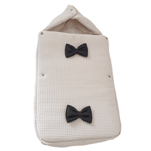 Afbeelding in Gallery-weergave laden, Voetenzak Dani - volledig wafel - strikjes - bies - in 30 kleuren