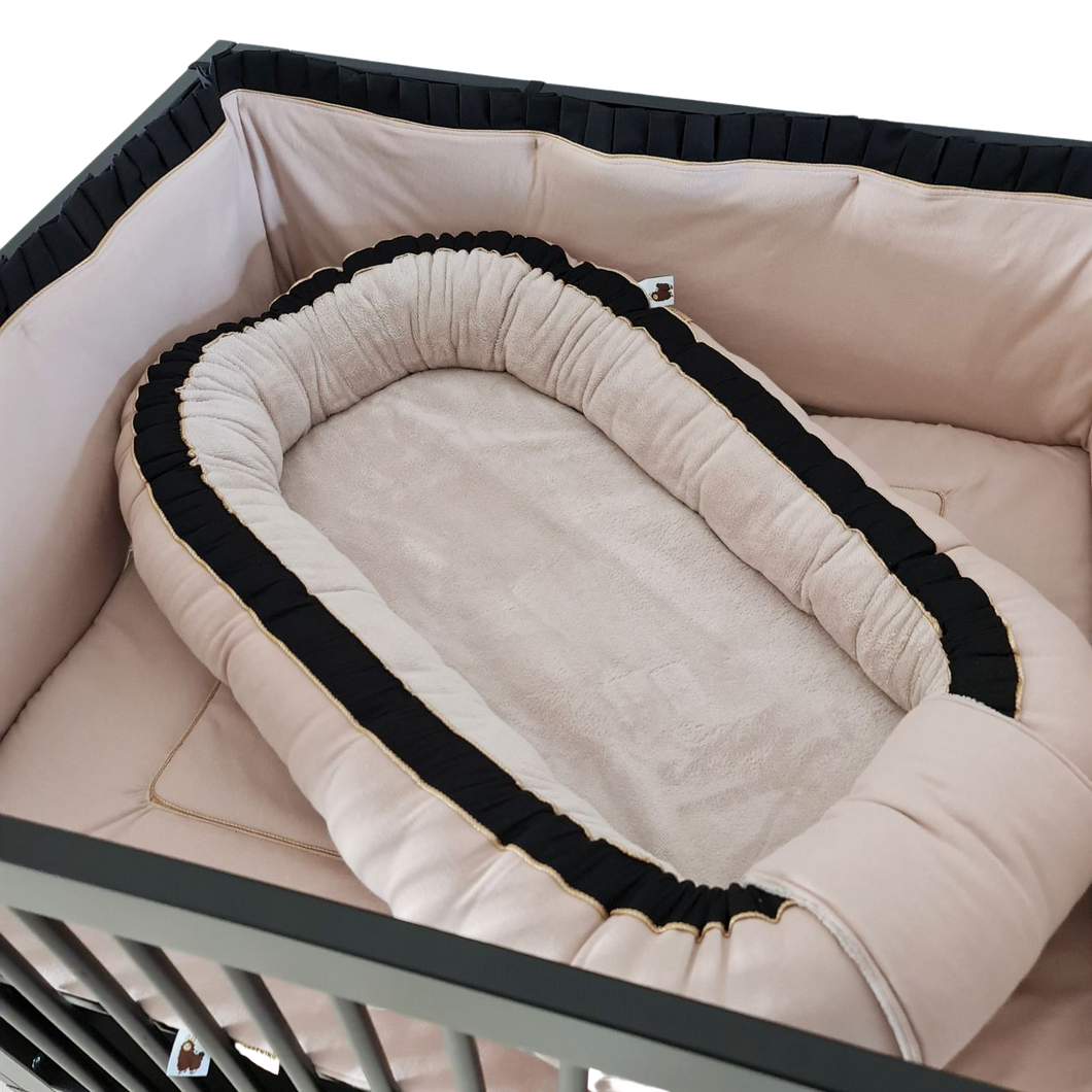 Babynestje Jaimy zand zwart goud bamboe badstof