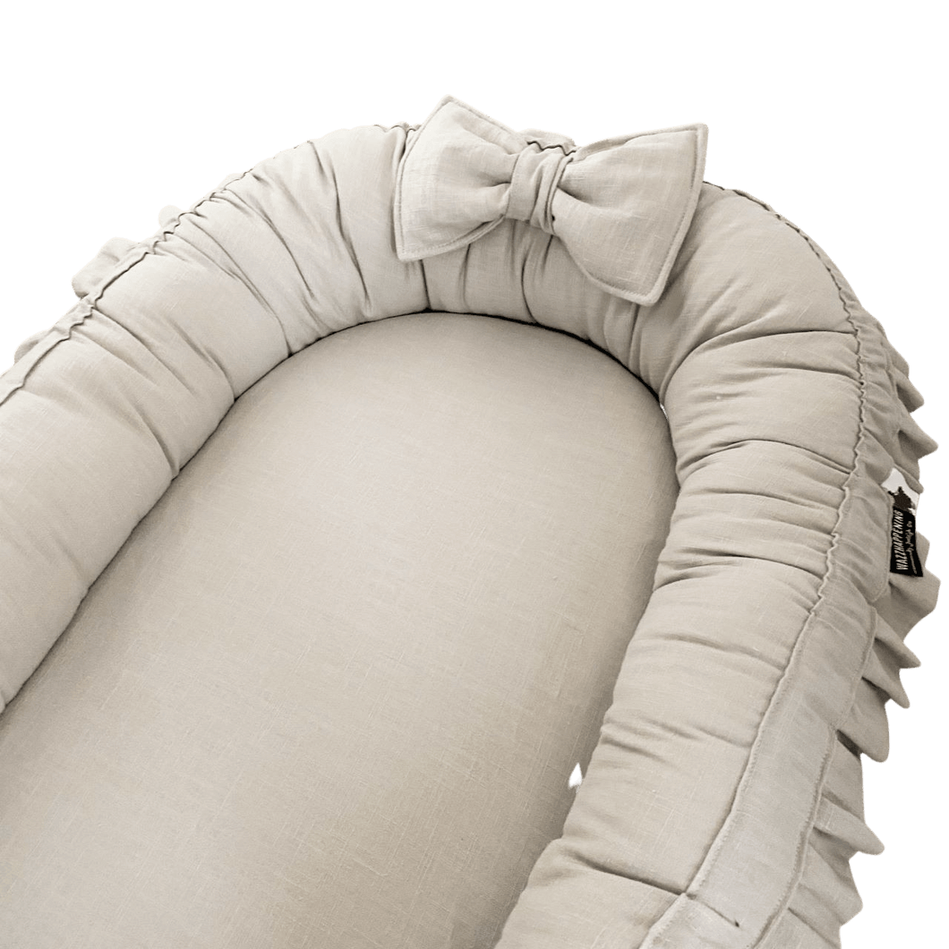 Babynestje Milou zand linnen beige ruffle strik luxe